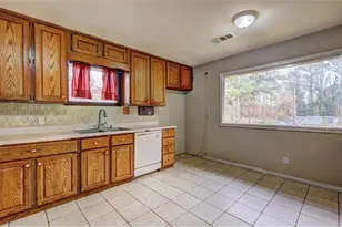 562 Dickens Rd NW, Lilburn, GA 30047 - Photo 19