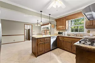 556 Daisy Nash Dr SW, Lilburn, GA 30047 - Photo 7