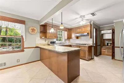 556 Daisy Nash Drive SW, Lilburn, GA 30047 - Photo 5