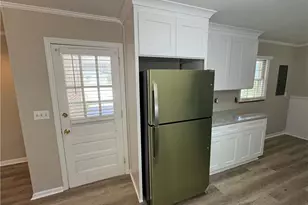 5594 Laurel Ln NW, Lilburn, GA 30047 - Photo 11