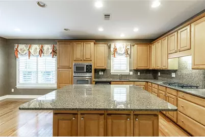 7042 Tree House Way, Flowery Branch, GA 30542 - Photo 19
