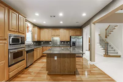 7042 Tree House Way, Flowery Branch, GA 30542 - Photo 21