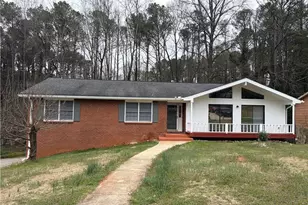 5252 Enchanted Cove SW, Lilburn, GA 30047 - Photo 1