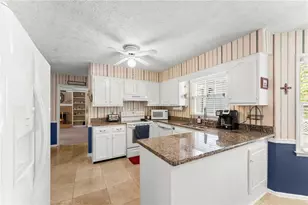 1087 Spring Mill Dr SW, Lilburn, GA 30047 - Photo 11
