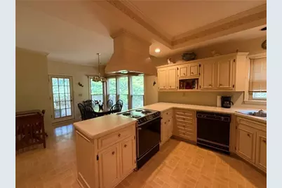 4651 Deep Creek Drive NE, Sugar Hill, GA 30518 - Photo 27
