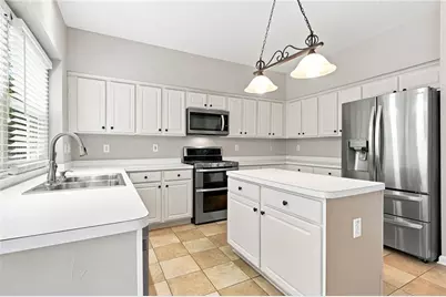 7765 Llangollen Way, Cumming, GA 30041 - Photo 9