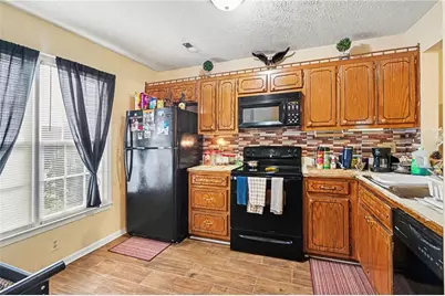 1674 Hunting Creek Drive, Conyers, GA 30013 - Photo 7