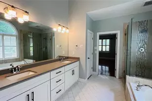 8569 Spring Breeze Terrace, Suwanee, GA 30024 - Photo 23
