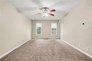 3884 Hunting Ridge Dr SW, Lilburn, GA 30047 - Photo 19