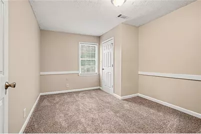 3884 Hunting Ridge Drive SW, Lilburn, GA 30047 - Photo 13