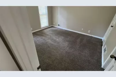 3884 Hunting Ridge Drive SW, Lilburn, GA 30047 - Photo 5
