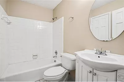 3884 Hunting Ridge Drive SW, Lilburn, GA 30047 - Photo 25