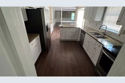 3884 Hunting Ridge Drive SW, Lilburn, GA 30047 - Photo 3