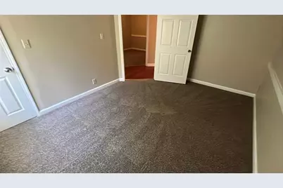 3884 Hunting Ridge Drive SW, Lilburn, GA 30047 - Photo 7