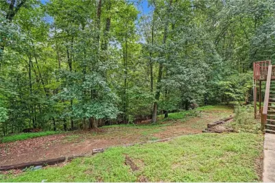 3884 Hunting Ridge Drive SW, Lilburn, GA 30047 - Photo 29