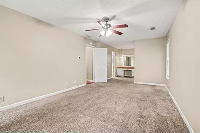 3884 Hunting Ridge Drive SW, Lilburn, GA 30047 - Photo 19