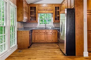 5040 Huntshire Ln SW, Lilburn, GA 30047 - Photo 13