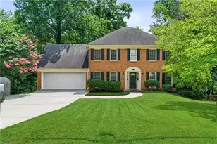 5040 Huntshire Ln SW, Lilburn, GA 30047 - Photo 1