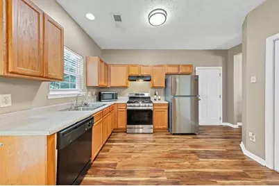 5745 Old Carriage Drive, Atlanta, GA 30349 - Photo 5