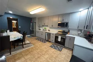 180 Village Green Ct SW, Lilburn, GA 30047 - Photo 3