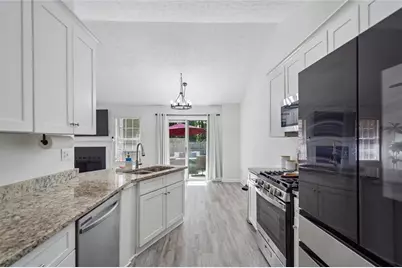 1077 Woodsong Pass Court, Lawrenceville, GA 30043 - Photo 15