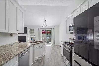 1077 Woodsong Pass Court, Lawrenceville, GA 30043 - Photo 15