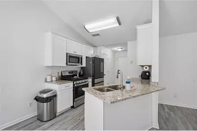 1077 Woodsong Pass Court, Lawrenceville, GA 30043 - Photo 13