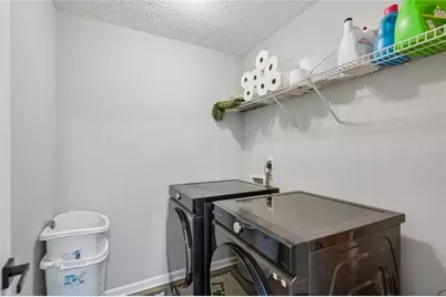 1077 Woodsong Pass Court, Lawrenceville, GA 30043 - Photo 29
