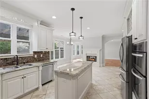 1335 Whisper Cove Dr, Buford, GA 30518 - Photo 7