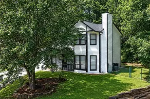 556 Sunfield Dr NW, Lilburn, GA 30047 - Photo 1