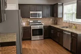 1055 Riverside Walk Crossing, Sugar Hill, GA 30518 - Photo 5
