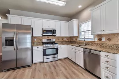 1444 Oglethorpe Drive, Suwanee, GA 30024 - Photo 17