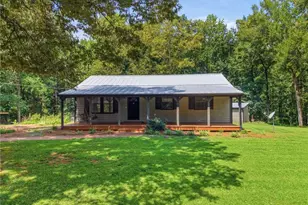 736 Wolfskin Rd, Arnoldsville, GA 30619 - Photo 1