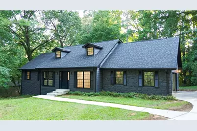 4877 Alpine Dr SW, Lilburn, GA 30047 - Photo 1