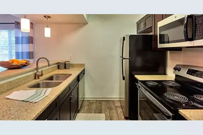 8601 Roberts Drive #01-09, Sandy Springs, GA 30350 - Photo 1