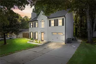 661 Sunfield Dr NW, Lilburn, GA 30047 - Photo 1