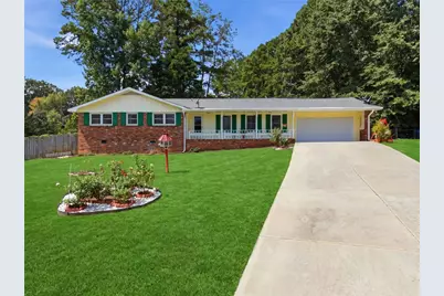 393 Greenleaf Court NW, Lilburn, GA 30047 - Photo 1