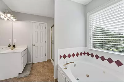 4564 Bogan Gates Trail, Buford, GA 30519 - Photo 25