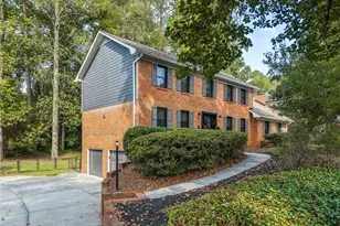 831 Montego Way SW, Lilburn, GA 30047 - Photo 1