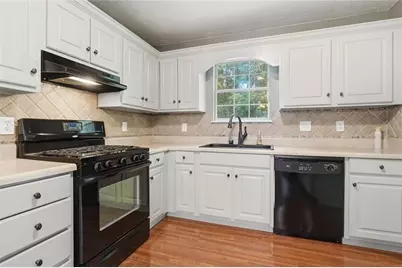 10690 Plantation Bridge Drive, Johns Creek, GA 30022 - Photo 13