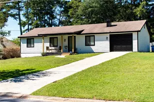 1077 Sawgrass Ct SW, Lilburn, GA 30047 - Photo 1