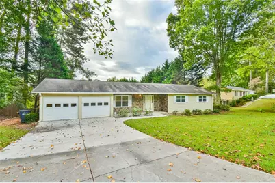 246 Greenwood Drive NW, Lilburn, GA 30047 - Photo 1