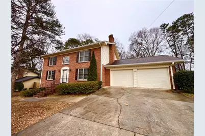 1176 Spring Mill Drive SW, Lilburn, GA 30047 - Photo 1