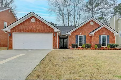 1296 Mandalay Court SW, Lilburn, GA 30047 - Photo 1