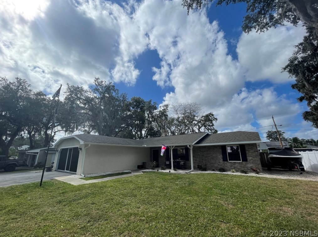 1722 Pine Tree Dr, Edgewater FL  32132-3208 exterior