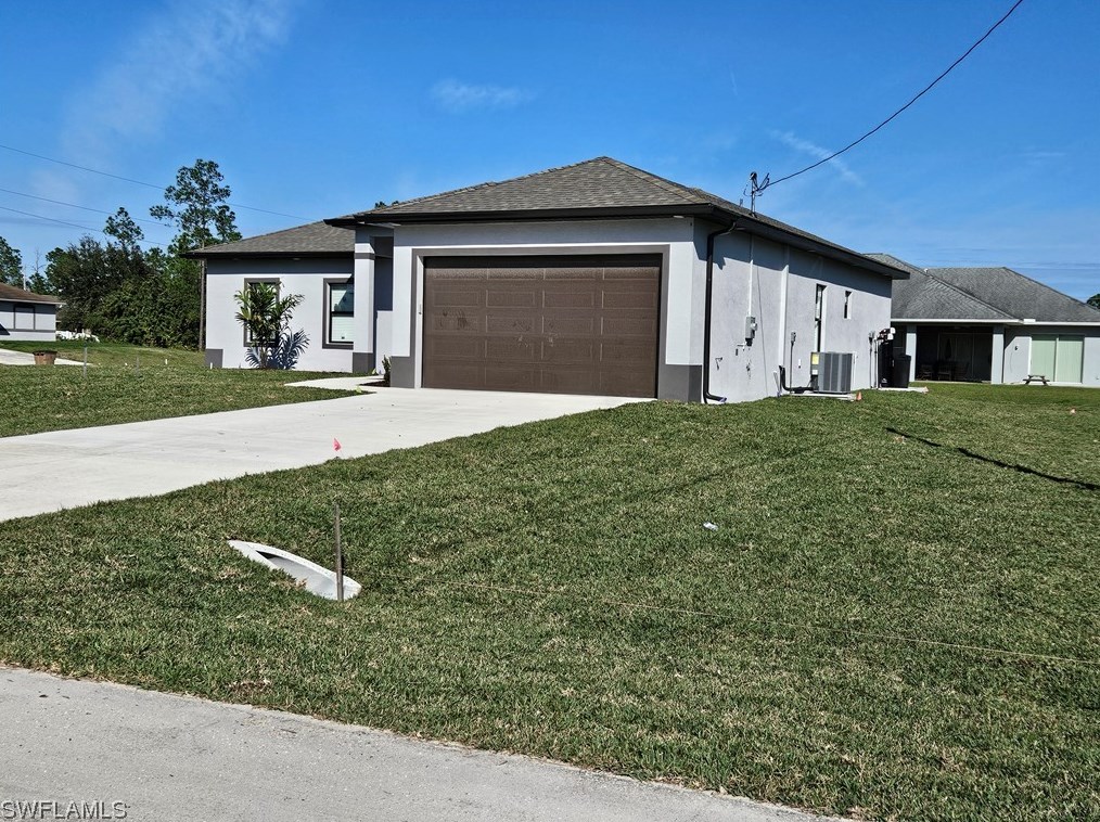 651 Keller St, Lehigh Acres FL 33974-7560 exterior