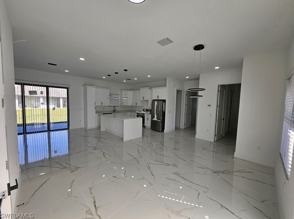 651 Keller St, Lehigh Acres FL 33974-7560 exterior