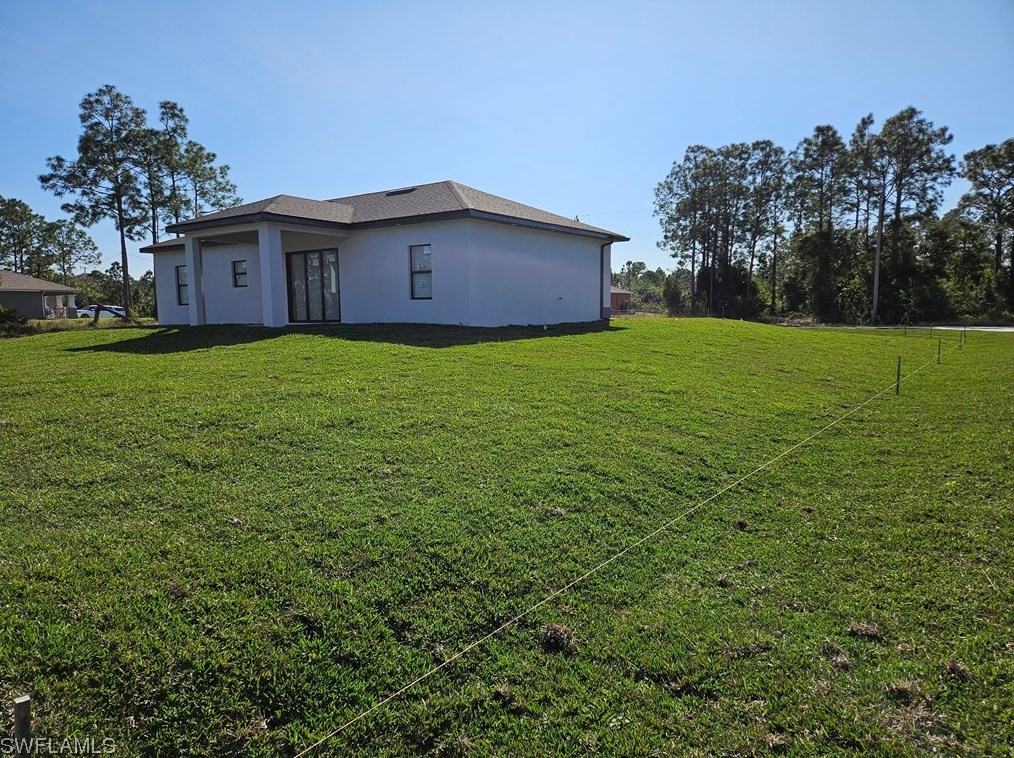 651 Keller St, Lehigh Acres FL 33974-7560 exterior