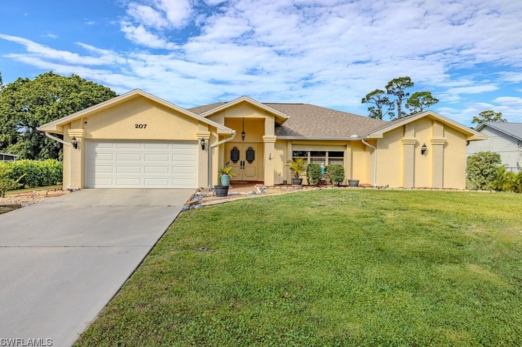 207 Lincoln Ave, Lehigh Acres FL  33936-1454 exterior