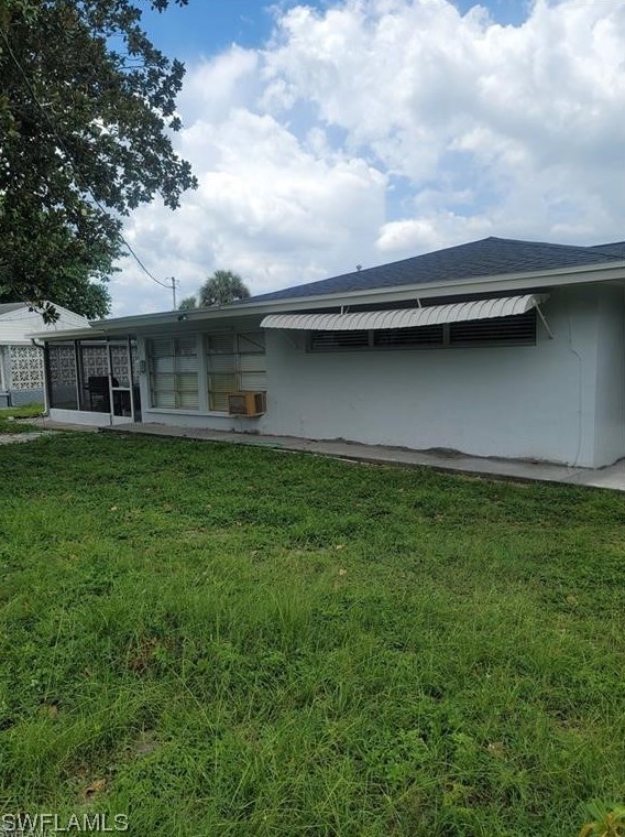 1406 Grandale St, Lehigh Acres FL 33936-5820 exterior